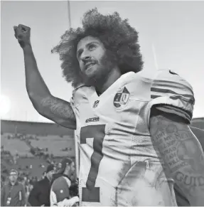  ?? ROBERT HANASHIRO/USA TODAY SPORTS ?? Colin Kaepernick, even though he is not on a team, remains a central figure in the NFL’s discussion­s on race.