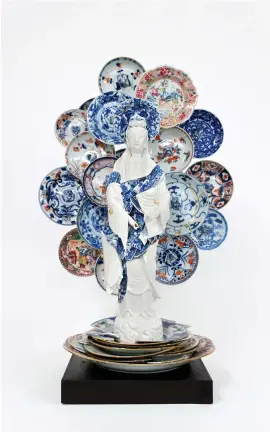  ??  ?? Left:
Guan Yin with a nimbus of saucers, 2019, 18thcentur­y Chinese porcelain and mixed media
Opposite page:
Memory vessel 35, 2015, 16th century Chinese Wan-Li porcelain jar, cover and glass