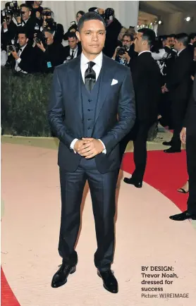  ?? Picture: WIREIMAGE ?? BY DESIGN: Trevor Noah, dressed for success