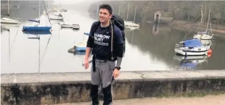  ??  ?? Joe Boote, 34, has completed a 300km hike with 35lb of weight strapped to his back over an 11-day period.
