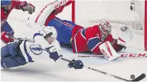  ?? P I E R R E O B E N D R AU F/ MO N T R E A L G A Z E T T E ?? Habs goalie Carey Price keeps his eye on the puck on a shot by the Lightning’s Alex Killorn on Monday.