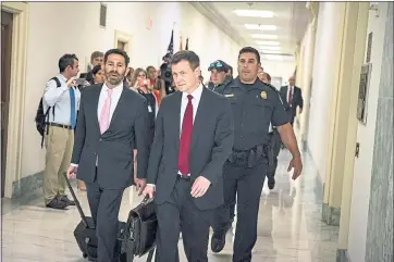  ?? AL DRAGO — BLOOMBERG ?? Peter Strzok, center, has come under scrutiny for a series of anti-Trump texts he sent to former FBI lawyer Lisa Page, with whom he was having an affair.