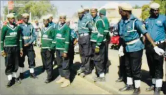  ??  ?? Hisbah Islamic Police in Kano