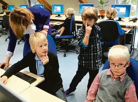  ?? Foto: Reuters ?? Už od sedmi let Estonští žáci se seznamují s programová­ním, vytvářením webových stránek i aplikacemi už od první třídy.