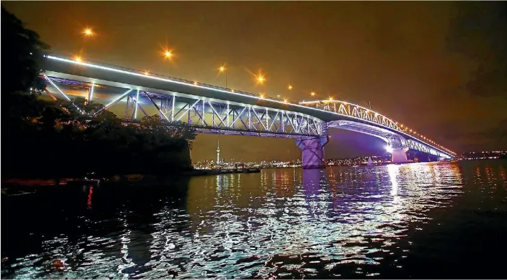  ?? PHIL WALTER/GETTY IMAGES ?? Every visible beam, arch, pile, girder, strut and pylon was lit up for the six-minute show on Auckland Anniversar­y weekend.