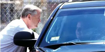  ?? ANGELA ROWLINGS / HERALD STAFF FILE; HERALD FILE (BELOW) ?? PASSENGERS: Gov. Charlie Baker chats with Mayor Martin Walsh, also seen below with his city SUV, last month. Both pols have police drivers while in office.