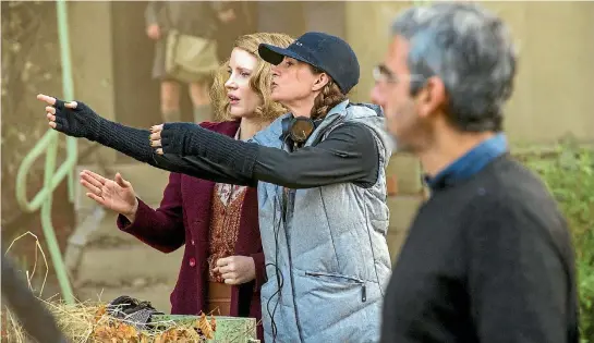  ?? PHOTO: WASHINGTON POST ?? Los Angeles-based New Zealand director Niki Caro working with lead actress Jessica Chastain on the set of The Zookeeper’s Wife.