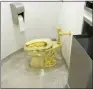  ?? AP PHOTO, FILE ?? This 2016 file image made from a video shows the 18-karat toilet, titled “America,” by Maurizio Cattelan in the restroom of the Solomon R. Guggenheim Museum in New York.