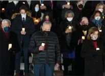  ?? ?? Democratic lawmakers at a vigil on the Capitol steps