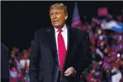  ?? EVAN VUCCI — THE ASSOCIATED PRESS ?? President Donald Trump arrives for a campaign rally at John Murtha Johnstown-Cambria County Airport in Johnstown, Pa., on Tuesday.