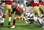  ?? RALPH FRESO — GETTY IMAGES, FILE ?? The 49ers’ Jeff Wilson (30) rushes ahead of the Bills’ Taron Johnson during their Dec. 7 game in Glendale, Ariz.