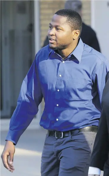  ?? RICHARD MARJAN / STARPHOENI­X / FILES ?? Timloh “Butchang” Nkem leaves Queen’s Bench Courthouse after being found guilty of sexual assault in September 2014 in Saskatoon. Nkem is now at large.
