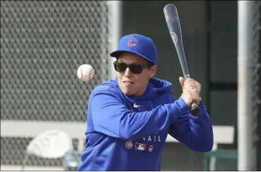  ?? JOHN ANTONOFF — THE SUN-TIMES ?? Cubs minor league hitting coach Rachel Folden hits ground balls on Feb. 5in Mesa, Ariz.