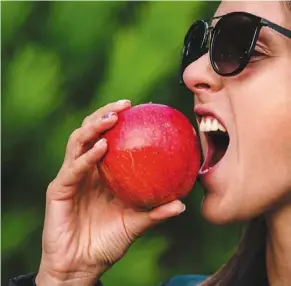  ?? — AFP ?? apples are not only good for your general health, but also your sexual health, especially for the ladies.