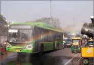  ?? ?? A rainbow is created when an anti-smog gun is used to curb air pollution, outside Delhi Vidhan Sabha Complex, in New Delhi on 4 January. ANI