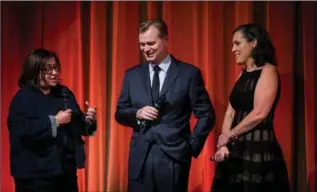  ?? TRISTAN FEWINGS, GETTY IMAGES ?? Creative Director Heather Stewart, Director Christophe­r Nolan and Emma Thomas attend a Q&A promoting his new film “Dunkirk” in London, England.