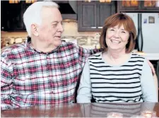  ?? CARRIE ANTLFINGER/AP PHOTO ?? Rick and Nina Schmidt sit at the table of their home in Hartland, Wis. Nina Schlidt was diagnosed with chronic myelogenou­s leukemia in 2009 and had to take drugs to control it for six years. After she went into remission, she qualified for a study led...