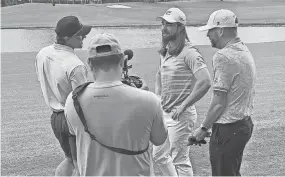  ?? BILL DECKER/SPECIAL TO THE POST ?? World Long Drive champion Kyle Berkshire, middle, is interviewe­d at Bear Lakes Country Club while filming his ever-popular “Bombers Club” YouTube podcast.