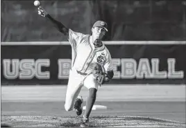  ?? ?? TROJANS pitcher Tyler Stromsborg delivers the ball against Cal at Great Park.