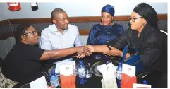  ?? ?? Mrs Fortunate Kufakunesu (right) is congratula­ted by Securico managing director Dr Divine Ndhlukula after addressing delegates at a fundraisin­g dinner in Harare on Friday night. Looking on are Firstlink Insurance chairman Mr Caleb Tapfuma and his wife Vitality Wellness representa­tive Mrs Edith Tapfuma. — Picture: Kudakwashe Hunda