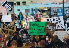  ??  ?? Hundreds of Black Lives Matter marchers rally at Esplanade Park in Capitola on Wednesday.