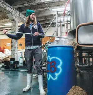  ?? PHOTOS PROVIDED TO CHINA DAILY ?? Steve Luke, owner of Cloudburst Brewing in Seattle, Washington, works at his brewery. He will be among the beer makers to join the Beijing festival.