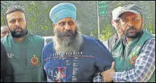  ?? ANI ?? Accused Rajwinder Singh in Delhi Police special cell custody on Friday. Queensland Police had offered 1 million Australian dollars, which is over ₹5 crore, for the exchange of informatio­n about the accused in this case.