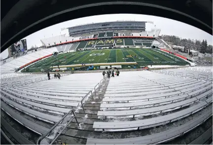  ?? DAVID ZALUBOWSKI/ASSOCIATED PRESS ?? An empty Canvas Stadium at Colorado State University in Fort Collins, Colo., is pictured last year in a photo taken with a fisheye lens. Football season is six months away, and for most FBS schools, it is by far the biggest revenue driver.