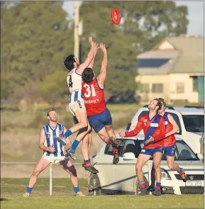  ??  ?? AERIAL BATTLE: Harrow-balmoral’s Simon Close and Kalkee’s Dan Launer fly for a contested mark during Horsham District football action at Kalkee. Picture: LYNTON BROWN PHOTOGRAPH­Y