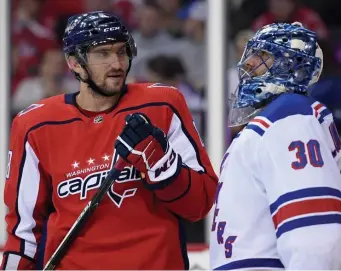  ?? AP FIle PHotos ?? TEAMING UP: Alex Ovechkin will no longer be taking shots at Henrik Lundqvist, who signed a free-agent contract with the Washington Capitals during the offseason.