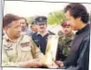  ?? AFP ?? Khan with former president General Pervez Musharraf in Lahore