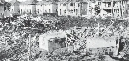  ??  ?? AFTERMATH: A scene in Hull after bombing wrecked homes – but the shelters took the brunt of the attack and still stood.
