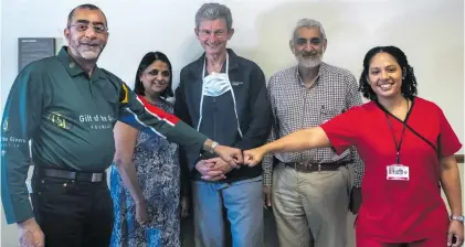  ?? ?? From left: Dr Imtiaz Sooliman, Dr Bhavna Patel (Groote Schuur Hospital [GSH] CEO), Prof Graham Fieggen (head of Clinical Department, Neurosurge­ry at GSH), Mustaq Brey (GSH Trust CEO) and Dr Lydia Cairncross (GSH head of General Surgery). Gift of the Givers has donated R5-million to the GSH Trust to help to reduce the backlog in operations at the hospital. Photo: Jaco Marais/Die Burger/Gallo Images