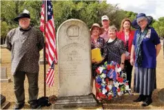  ?? (Special to The Commercial) ?? At the grave of Solomon Spence Sr., the dedication participan­ts were, from left, Dale Lovell of the General Society War of 1812; Pat McLemore of the Baseline-Meridian Chapter United States Daughters of 1812; Charles McLemore, Sons of the American Revolution state president; Jerrie Townsend, U.S.D. 1812 state president; Bobbie Lovell, Baseline-Meridian markers chair; and Sheila Beatty, U.S.D. 1812 state markers chair.