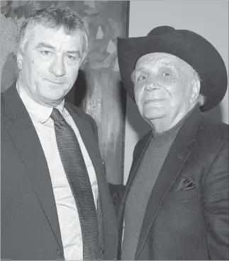  ?? REUTERS ?? Oscar-winning actor Robert DeNiro, left, poses with boxer and author Jake LaMotta at a screening to celebrate the 25th anniversar­y of “Raging Bull” at the Ziegfeld Theater in New York on Jan. 27, 2005.