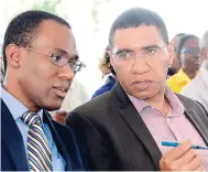  ?? FILE ?? Dr Nigel Clarke (left) and Prime Minister Andrew Holness.