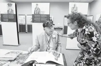  ?? Photos by Brett Coomer / Staff photograph­er ?? Birney “Chick” Havey Jr., a former U.S. soldier during World War II, chats with Jamie Josephs, whose father, Herman, also helped liberate concentrat­ion camp prisoners.