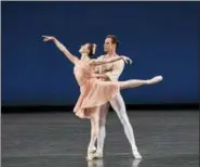  ??  ?? Tiler Peck and Andrew Veyette in Balanchine’s “Allegro Brillante.”