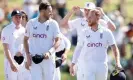  ?? Photograph: Phil Walter/Getty Images ?? Ben Stokes (right) leads his team from the field after England’s win in Mount Maunganui.