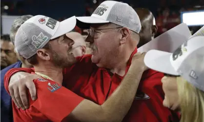  ??  ?? Britt Reid, left, embraces his father Andy after last year’s Super Bowl. Photograph: Patrick Semansky/AP