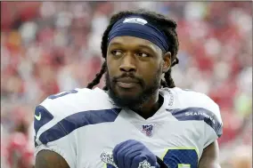  ?? RICK SCUTERI — THE ASSOCIATED PRESS FILE ?? In this Sept. 29, 2019, file photo, Seahawks outside linebacker Jadeveon Clowney (90) watches during a game against the Cardinals in Glendale, Ariz. Jameis Winston, Cam Newton and Clowney didn’t have to wait long at all to find homes in the NFL when they came out of college. The three former No. 1 overall draft picks are finding things moving much more slowly as they search for new homes or contracts this offseason.