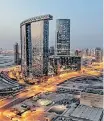  ?? ?? ICONIC Al Reem Island buildings, Gate Towers, The Arc, The Sun Tower and The Sky Tower, seen at sunset. | Unsplash