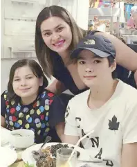  ??  ?? Aiko Melendez with children Andre (by exhusband Jomari Yllana) and daughter Marthena (by ex-husband Martin Jickain):