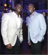  ?? DARIO CANTATORE — THE ASSOCIATED PRESS ?? NFL players Jason McCourty, left, and Devin McCourty pose at the VIP Reception hosted by the NFLPA in New Orleans. The twin brothers will be playing for the Patriots this coming season.