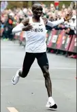  ??  ?? NEW ERA: Kipchoge at the finish