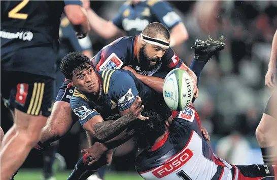  ?? Picture / Photosport ?? Malakai Fekitoa scored two tries for the Highlander­s and was generally a handful for the Rebels last night.