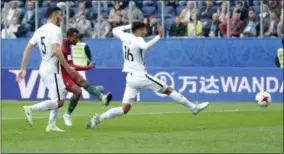  ?? IVAN SEKRETAREV — THE ASSOCIATED PRESS ?? Portugal’s Nani, 2nd left, scores his side’s fourth goal during the Confederat­ions Cup, Group A soccer match between New Zealand and Portugal, at the St. Petersburg Stadium, Russia, Saturday.