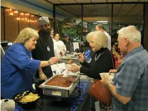  ?? Staff photo by Greg Bischof ?? ■ Chili cooks serve up their specialtie­s at the 19th annual Texarkana Area Veterans Council’s Chili Cook-Off Fundraiser on Friday at Texarkana College’s Truman Arnold Student Center. The event took in $1,814. The money will help the council replace...