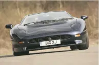  ??  ?? ZOOMING AHEAD Far le , values of air-cooled Porsche 911s continue to rise. Le , just 64 McLaren F1s were built for road use, and they are highly sought a er. Above, the Jaguar XJ220, once the world’s fastest production car, turned 20 in 2012