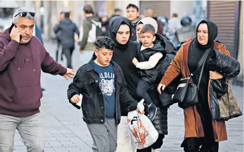  ?? ?? Crowds screamed and ran for safety after an explosion killed six people on Istiklal Avenue, one of Istanbul’s busiest shopping streets, at about 4pm local time yesterday